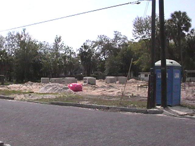 Footings, stem walls, utilities, fill, and slabs for the two Rinoldo houses.