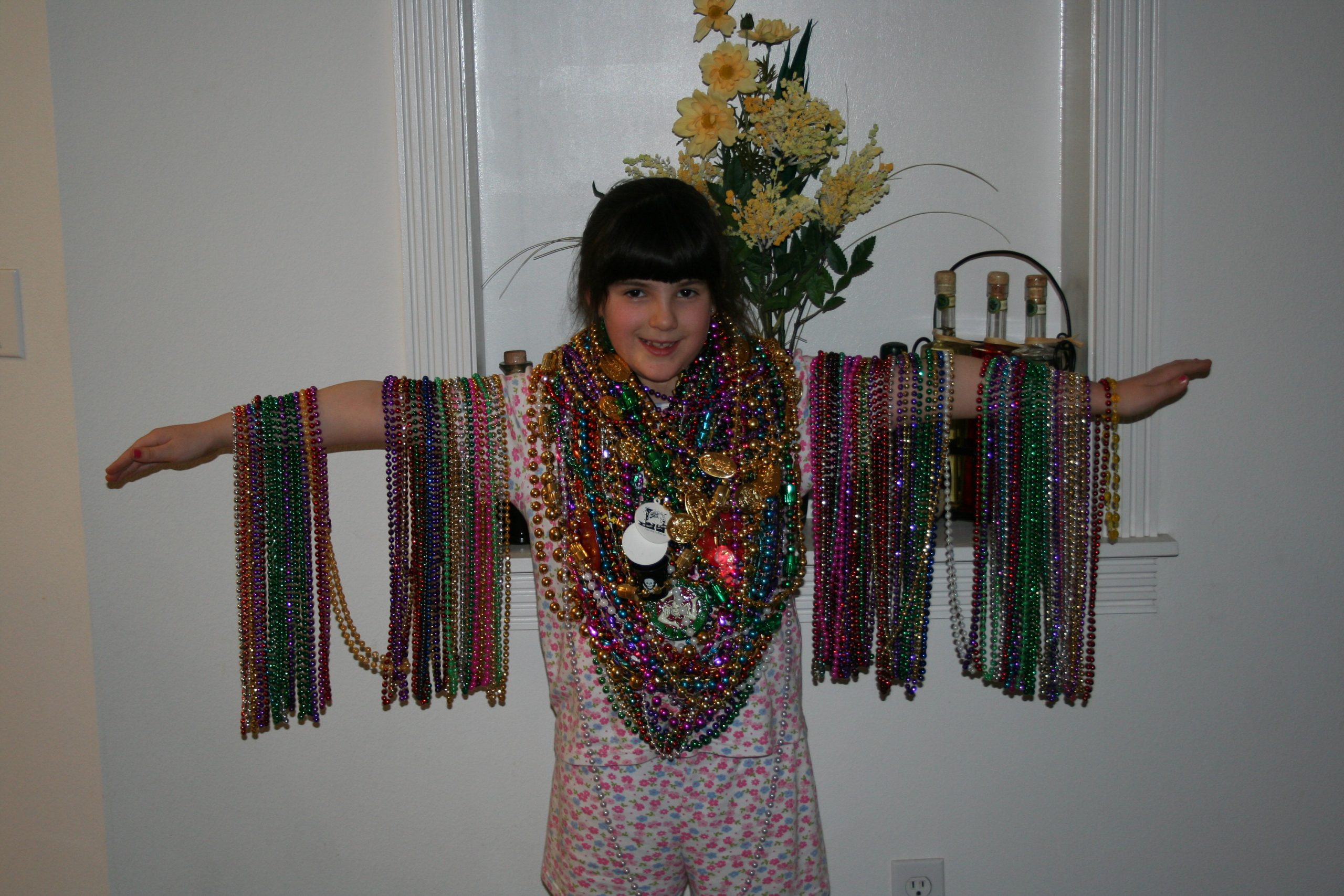 Rebecca wearing the beads she caught at the Ybor City Illuminated Night Parade