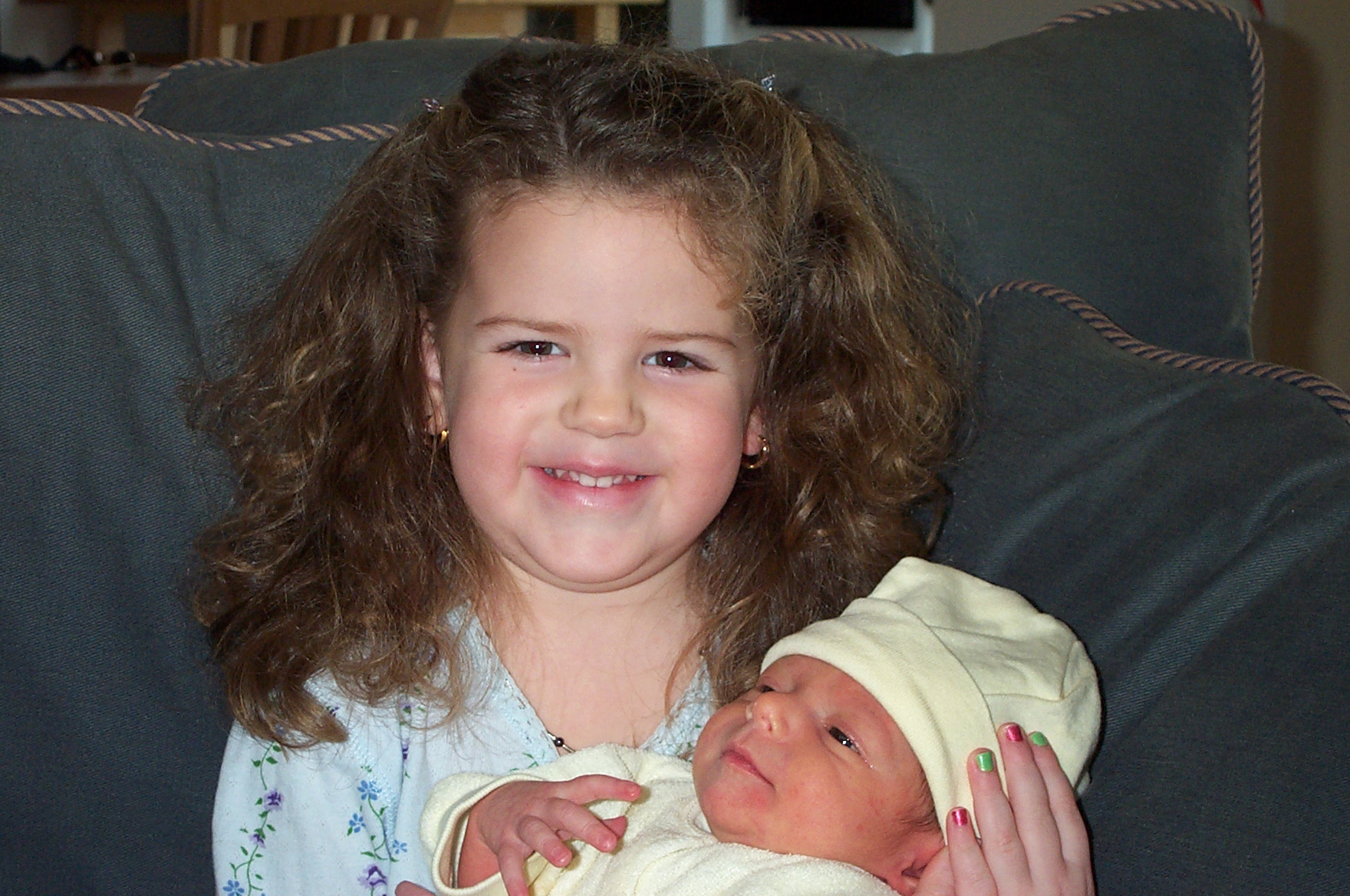 Thomas J. Potenza held by his cousin Arianna.