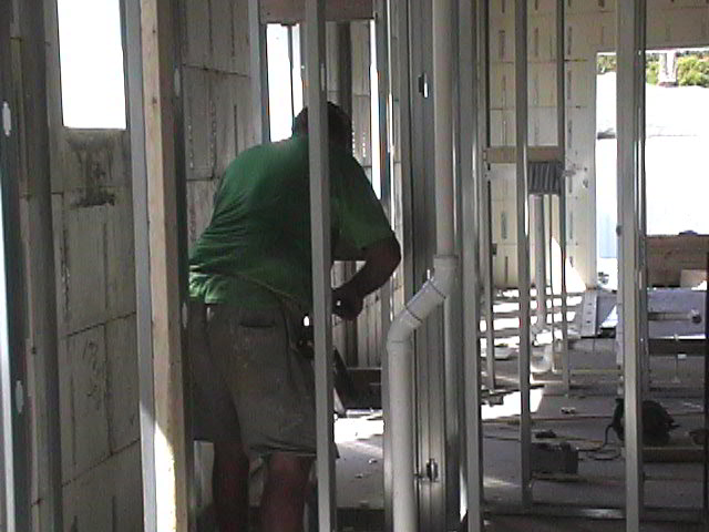 An original photograph of the interior construction of Traci’s house.